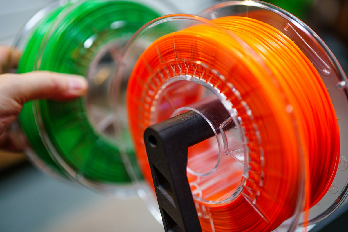 Colourful filament spools used to illustrate ASA printing