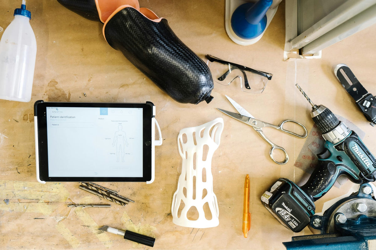 Flexible 3D-printed protective part on a workshop table