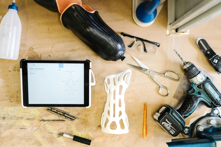 Flexible 3D-printed protective part on a workshop table